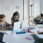 Group of Kids Using Computer in School