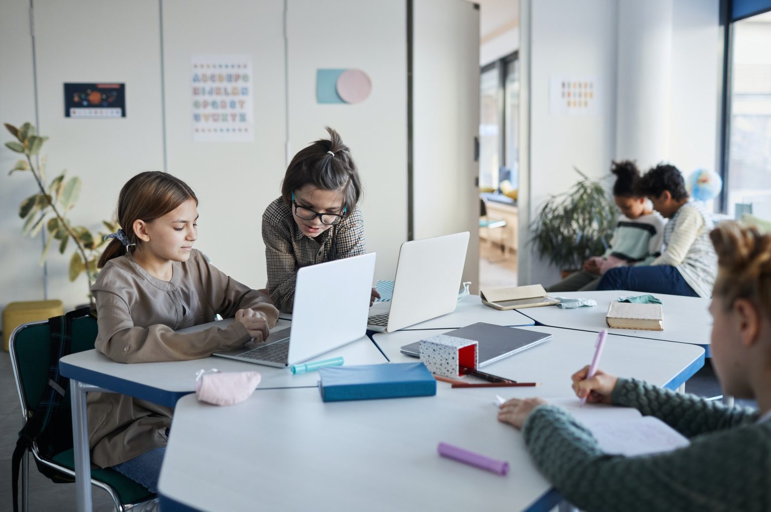 Group of Kids Using Computer in School